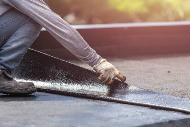 Professional Exterior Waterproofing technician working in Dansville, MI
